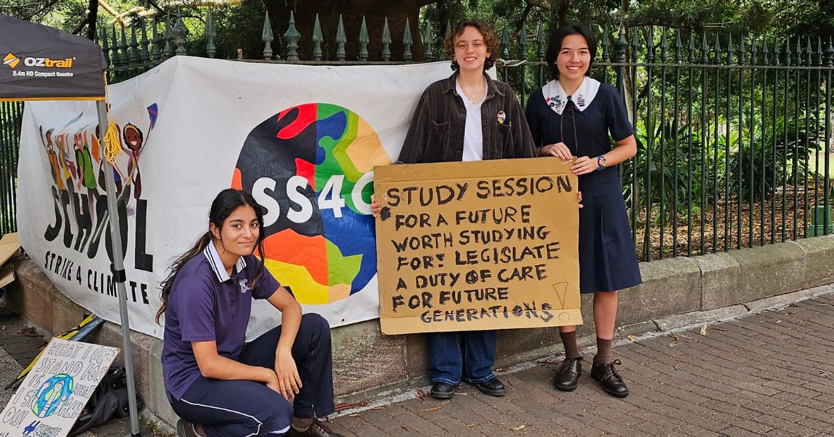 Students hold ‘study-in’ outside Queensland Parliament in climate strike for their future.